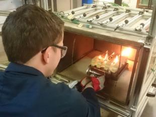Undergraduate student working in the fire lab