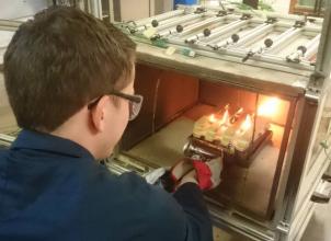 Undergraduate student working in the fire lab